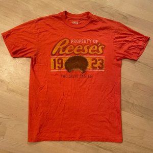 Reese's orange tee size Medium